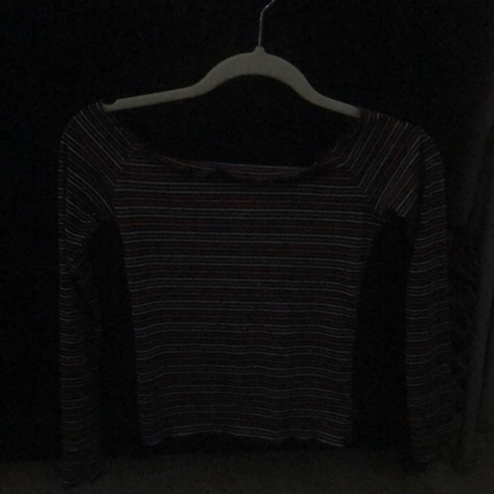 It is a small it has Navy blue, red, white and mustard yellow